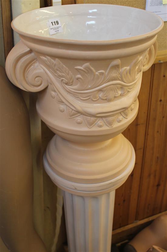 Pink pottery jardiniere on pedestal(-)